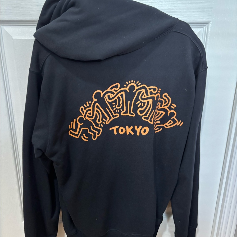 Keith Haring Black Graphic Hoodie with Orange Design